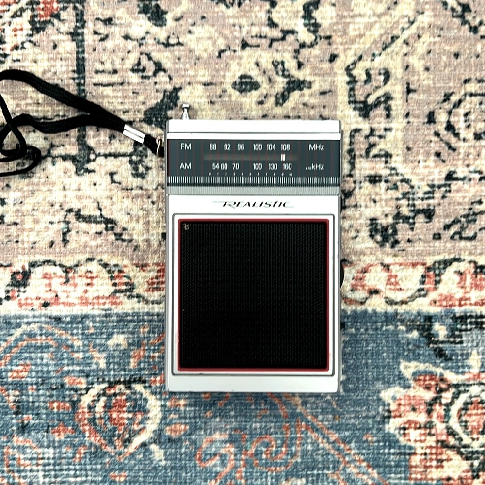 Vintage AM/FM pocket radio with box